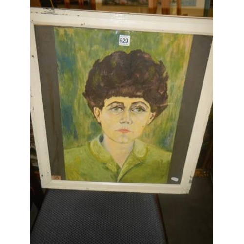 629 - A framed and glazed oil on paper painting of Woman in green top signed T Finch  COLLECT ONLY.