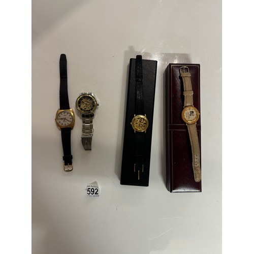 592 - A boxed Accurist watch & 3 others including 1 manufactured by Winner