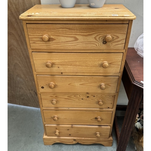 401 - A solid pine chest of drawers