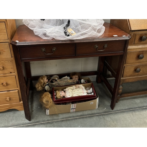 404 - A mahogany two drawer side table / desk