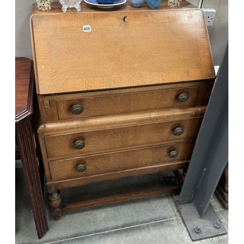 409 - A mid 20th century oak bureau, COLLECT ONLY.