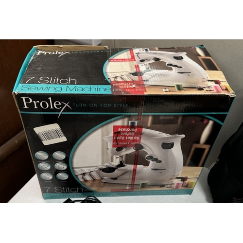 411 - A boxed Prolex 7stitch sewing machine