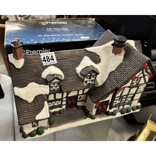 484 - A boxed ceramic Christmas Tudor pub