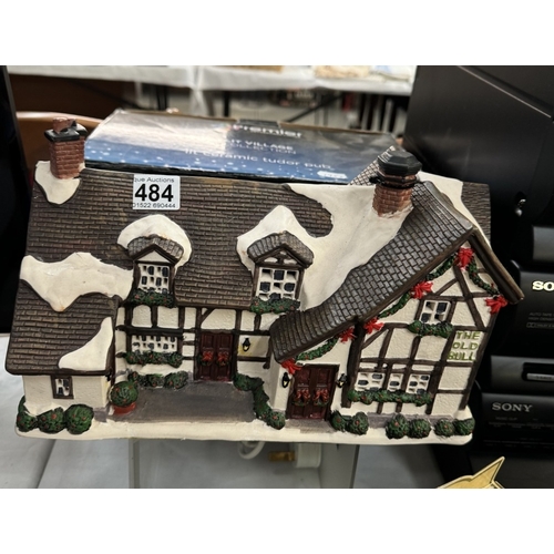 484 - A boxed ceramic Christmas Tudor pub