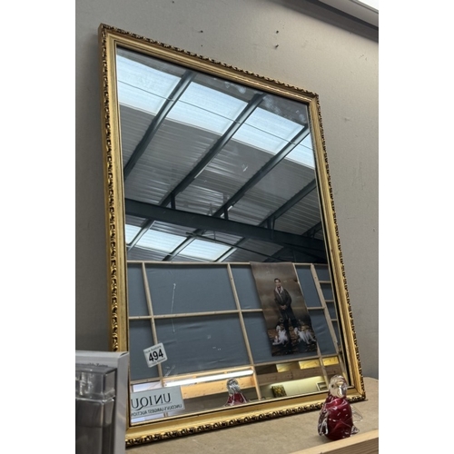 494 - A gilt framed mirror. 63 x 48cm