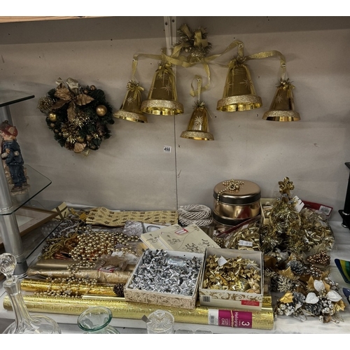 498 - A quantity of gold coloured Christmas decorations