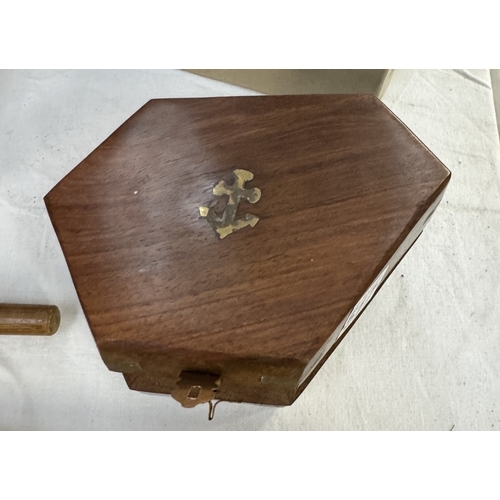 517 - A mini sextant in hard wood case