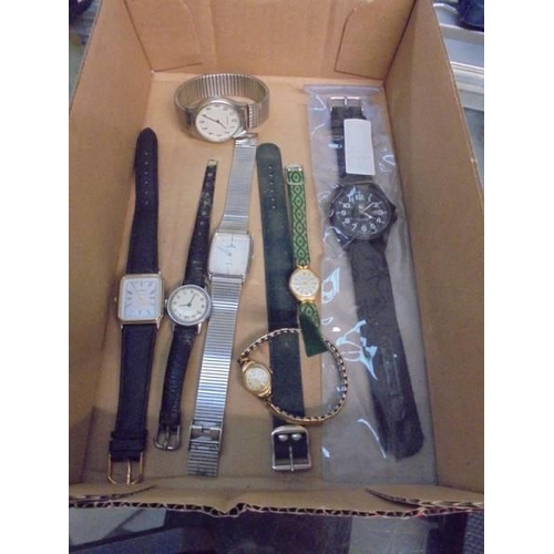 532 - A mixed lot of watches and a pen set.