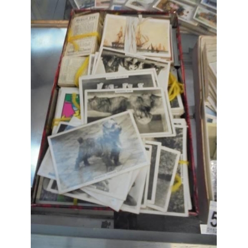 534 - A good lot of cigarette cards etc.,