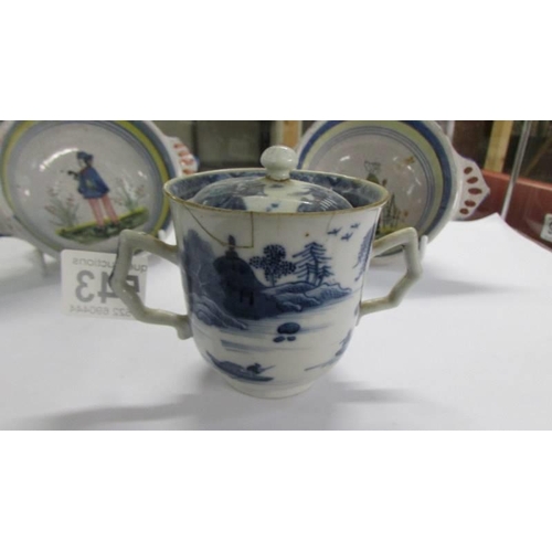 543 - An antique Chinese pattern blue and white chocolate cup with cover, a/f.