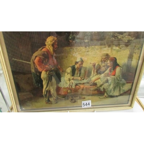 544 - A  framed and glazed lithograph featuring an Arabic scene signed P Ivanovitch. COLLECT ONLY.