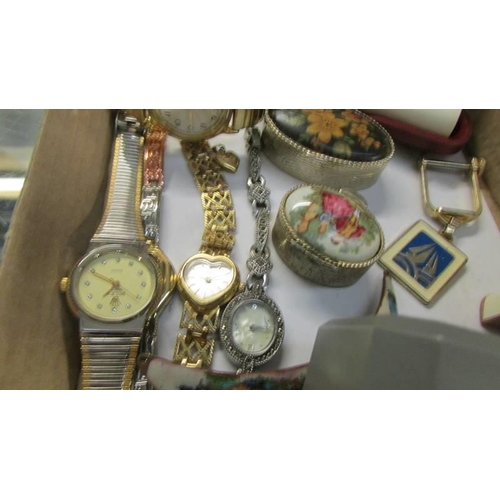 552 - A mixed lot including pill boxes, watches etc.,