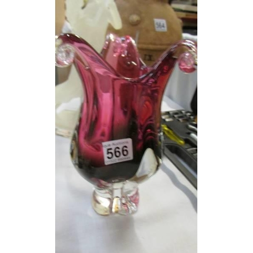 566 - A studio glass vase.