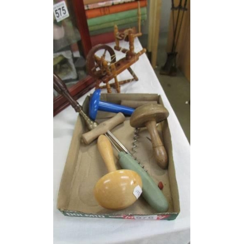 576 - A mixed lot of wooden items including darning mushrooms, miniature spinning wheel etc.,