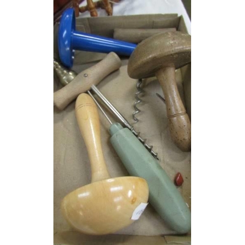 576 - A mixed lot of wooden items including darning mushrooms, miniature spinning wheel etc.,