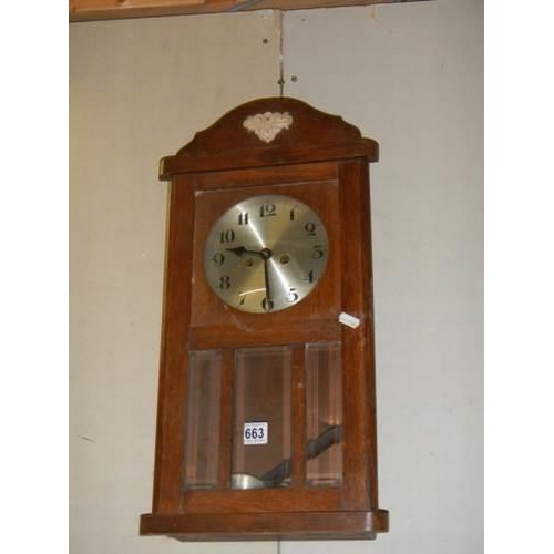 663 - An oak wall clock, COLLECT ONLY.