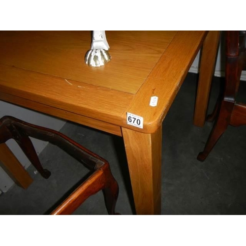 670 - A good quality light oak kitchen table, COLLECT ONLY.