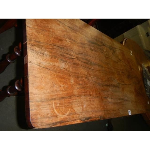 673 - A Victorian rosewood side table (some veneer loss - good restoration project). COLLECT ONLY.