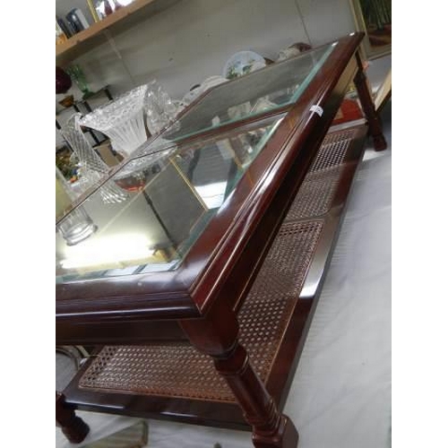 701 - A mahogany glass topped coffee table, COLLECT ONLY.