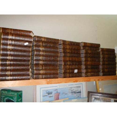 712 - A large lot of hard back books.