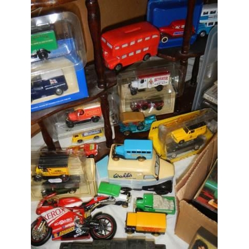 714 - A mixed lot of die cast models with shelf. COLLECT ONLY.