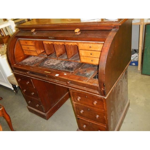 719 - A Victorian mahogany barrel top clerks desk, COLLECT ONLY.