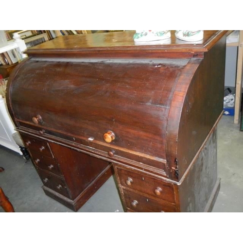 719 - A Victorian mahogany barrel top clerks desk, COLLECT ONLY.