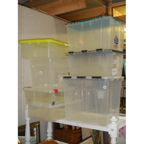 723 - Seven plastic storage boxes with lids, COLLECT ONLY.