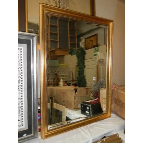 688 - A good gilt framed bevel edged mirror, COLLECT ONLY.