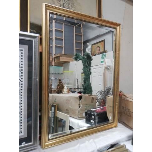 688 - A good gilt framed bevel edged mirror, COLLECT ONLY.