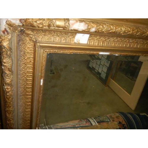 690 - A Victorian bevel edged mirror,. COLLECT ONLY.