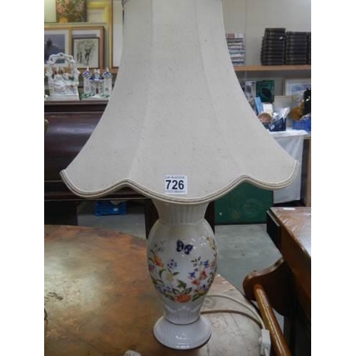 726 - An Aynsley table lamp with shade.