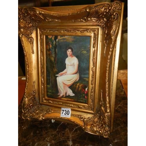 730 - A gilt framed study of a lady reading.