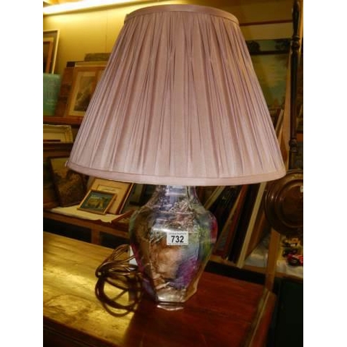 732 - A late 20th century ceramic table lamp with shade.