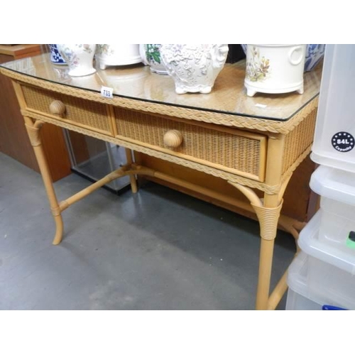 733 - A late 20th century two drawer cane table, COLLECT ONLY.