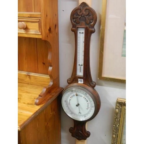 750 - An Edwardian oak barometer, COLLECT ONLY.