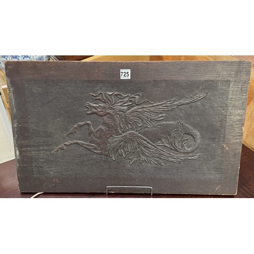 725 - A carved wood panel featuring a horse,.