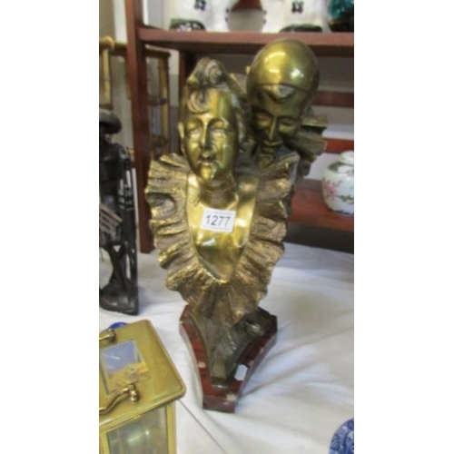 1277 - A large bronze bust of two Pierrot's.