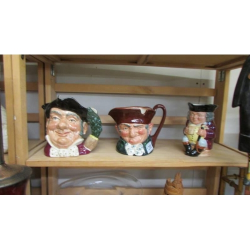 1288 - Two Royal Doulton character jugs and a Toby jug.