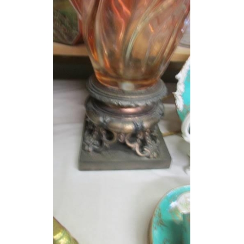 1295 - A tall red glass table lamp on metal base, will need re-wiring, COLLECT ONLY.