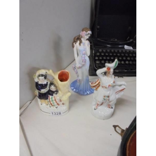 1328 - A Coalport figurine and two Staffordshire figures.