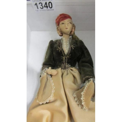 1340 - An early 20th century fashion doll.