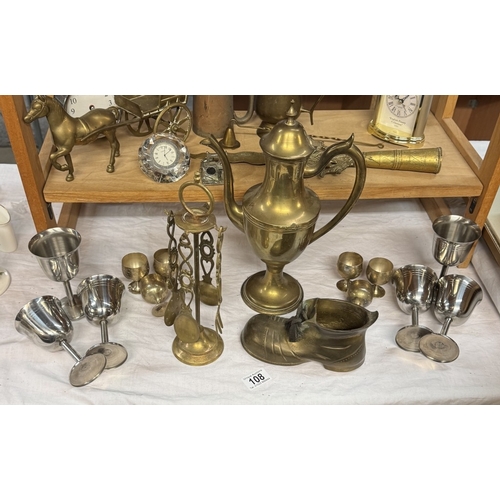 108 - A quantity of brass & metalware including horse & carriage etc