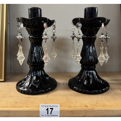 17 - A pair of glass lustre candle sticks