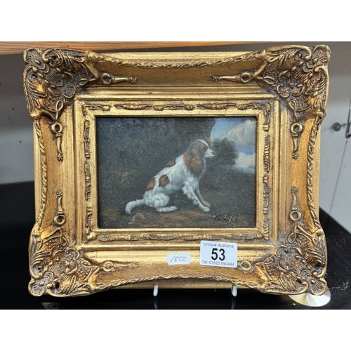 53 - A gilt framed over painted print of a dog. 30 x 25cm