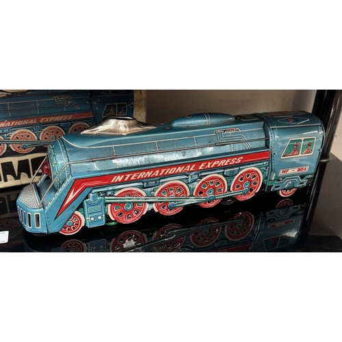 54 - A large tinplate friction international express locomotive, boxed