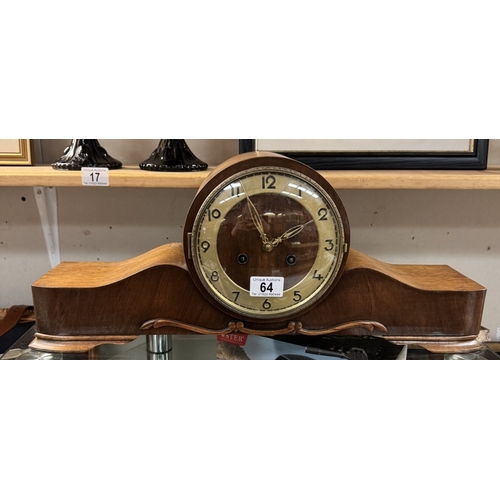 64 - A 1930s oak mantle clock