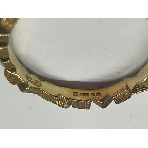 1006 - An 18ct (750) gold ring, size P, 3.4 grams.