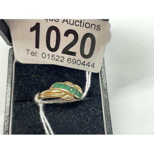 1020 - A 9ct yellow gold emerald and diamond ring, size P, 2.6 grams.