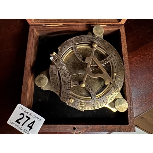 274 - A brass nautical compass / sundial in teak box